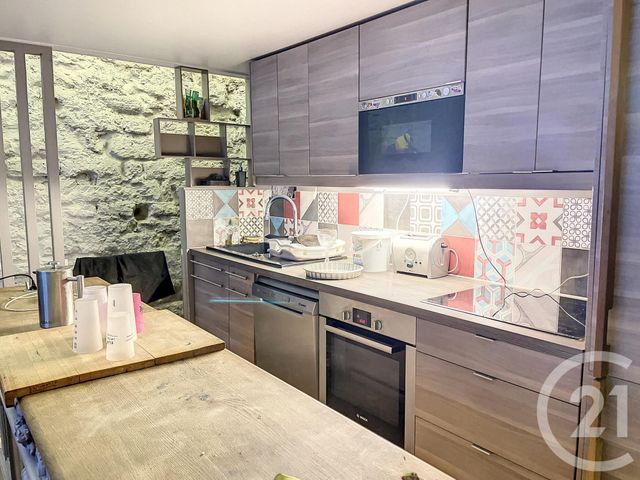 Appartement Duplex à vendre - 4 pièces - 82.0 m2 - PARIS - 75018 - ILE-DE-FRANCE - Century 21 Magenta La Fayette
